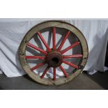 A painted cart wheel with iron tyre, Diameter 34ins