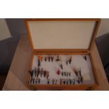 Two mahogany cases of salmon flies