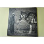 Simon Buttimore, monochrome photograph of Simon standing with his horse on canvass, 32 x 32ins