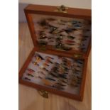 Mahogany box of numerous salmon and sea trout flies