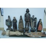 Collection of eight antique carved religious and other figures, most with painted decoration.