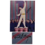 Colorful photo signed, ''Fred Astaire'' in black felt tip. The dancing star strikes a lively pose