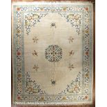 Large Chinese-Style Carpet, cream ground, stylized floral designs in blue, rose, green and brown, 13