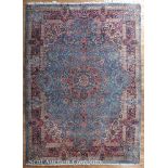 Kirman Carpet, sky blue ground with overall floral design in pinks and beiges, 8 ft. 10 in. x 11 ft.