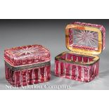 Pair of French Cranberry Cut-to-Clear Glass Boxes, c. 1880, brass mounts, h.3 1/4 in., w. 4 1/8 in.,