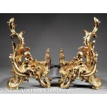 Pair of Louis XV-Style Bronze Chenets, seated putti amidst foliate scrolls, h. 21 in., w. 13 in., d.