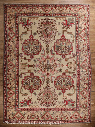 Persian Bakhshish Carpet, tan ground, repeating central medallions in red, green, blue and brown, 10