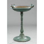 American Cast Iron Birdbath, 20th c., circular basin with two resting doves, lotus shaft, leaf pad