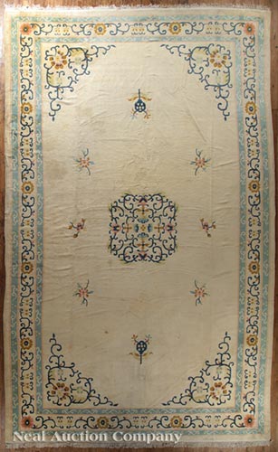 Large Chinese-Style Carpet, cream ground, stylized floral designs in blue, rose, green and brown