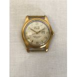 An Ancre gold plated gentleman’s wristwatch, the dial with arabic and baton numerals with