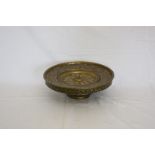 A Middle Eastern brass, copper and silver decorated incense burner, the central bowl with