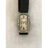 A ladies platinum and diamond set cocktail watch, the Art Deco style case with diamond set bezel,