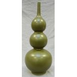 A 20th Century Chinese porcelain vase of triple gourd form with a slender, cylindrical neck and