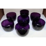 SECTION 9. A Set of Seven late 19th/early 20th Century Amethyst glass finger bowls, approximately