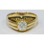 A gents 18ct gold solitaire diamond ring claw set with a round brilliant cut diamond, I in colour,