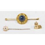 A 9ct gold bar brooch with centrally set cabochon Lapis Lazuli, together with a 9ct gold bracelet