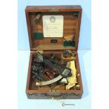 A Hezzanith black lacquered sextant retailed by F. Robson & Co. Newcastle, housed in a fitted wooden