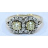 A Victorian 18ct gold and two-stone yellow diamond ring, claw-set to the top with two Victorian-