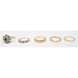 A group of five 9ct gold rings, comprising 3 bands, a Diamond, Sapphire and Opal ring and a