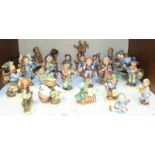 SECTION 1. A collection of 25 Goebel Hummel figurines including; Strolling along, Retreat to safety,