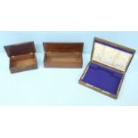 Three various wooden boxes with hinged tops.