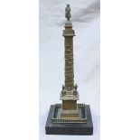 A Bronze model of Napoleons' Vendôme column in Paris, mounted to a slate pedestal base. 31cm high.