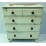 A Victorian painted pine chest of two short over three long, graduated drawers, raised on turned