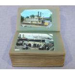 A collection of approximately 100 postcards depicting paddle steamers in a small album.