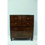 A 19th century mahogany chest of 2 short and 3 long drawers, rounded brass handles, 103cm high