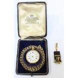 A 14k gold open face pocket watch, the white enamel dial with Roman numerals denoting hours and