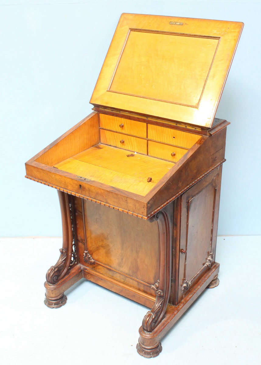 A Victorian walnut Davenport desk, the hinged, sloped front with gilt tooled leather scribe, opening - Image 2 of 2