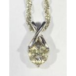 A 9ct gold solitaire diamond pendant and fine necklace chain, RBC diamond weighing approximately 0.