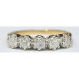 An 18ct gold five stone diamond ring claw set with round brilliant cut diamonds, the diamonds