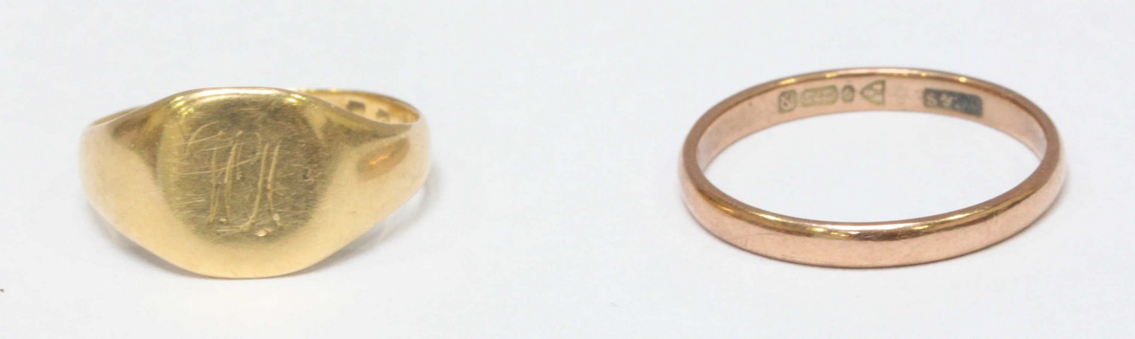 An 18ct gold signet ring with engraved initials to top, 2.3g, together with a 9ct gold ring, 1.2g