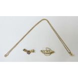 ADDENDUM: BROOCH IS ROLLED GOLD: A 14ct gold brooch with rope twist effect, together with a 9ct gold