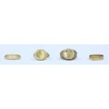 Four various 9ct gold rings, including one mounted with a simulated miniature sovereign Gross weight