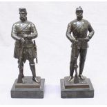 A pair of 19th century Bronze figures of Military personal both in formal wear, one wearing a