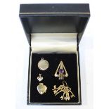 A group of four 9ct gold Pendants and charms, including a set of keys, an art deco style pendant
