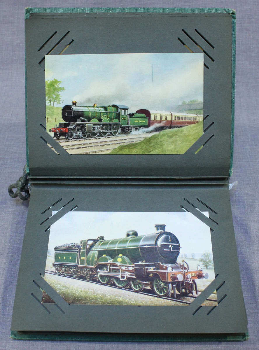 A collection of approximately 50 postcards of railway interest, including various engines and two