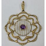 A 15ct gold openwork pendant set with amethyst and seed pearls.