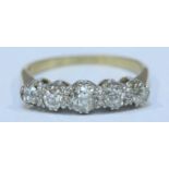 An 18ct gold five stone diamond ring, claw-set with four graduated Victorian-cut diamonds and one