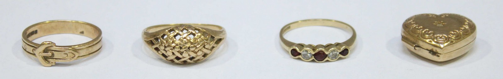 Three various 9ct gold rings, together with a 9ct gold heart locket. Gross weight approximately 8.