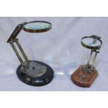 Two Articulated magnifying glasses by Watts and Sons Ltd, both with plagues reading "London 1814",