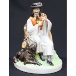 A Zsolnay pottery figure group of a seated man playing a flute next to a dog, 23cm high