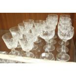 Sixteen Stuart drinking glasses, consisting 8 Hock glasses and 8 Wine glasses, all stamped to