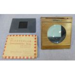 A Dufaycolor transparencies viewer with original box.