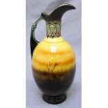 A hand painted Doulton Burslem Holbein ware style ceramic Ewer with scenic decoration of a