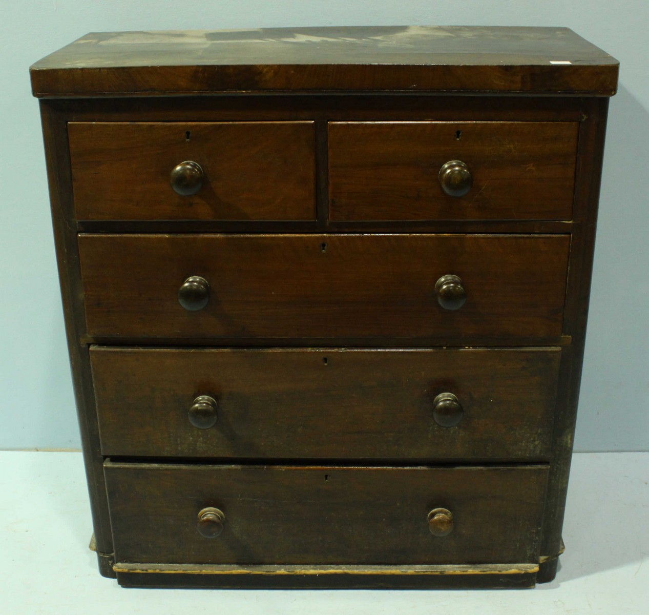 A 19th century mahogany chest of 2 short and 3 long drawers, 109cm high by 96cm wide, 2 legs missing