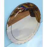 A Rose-tinted circular mirror with bevelled edge, 75cm wide