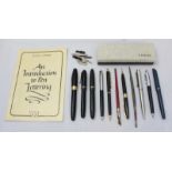 A collection of various fountain pens, ballpoint pens and pencils, including a boxed Osmiroid